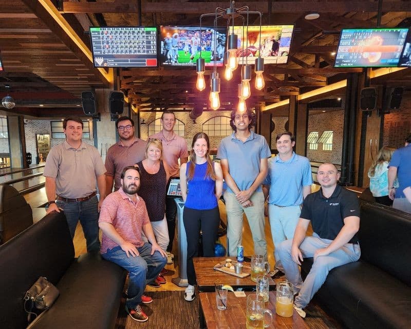 The full Southland team at Bowl & Barrel, gathered around the lanes to celebrate Q2